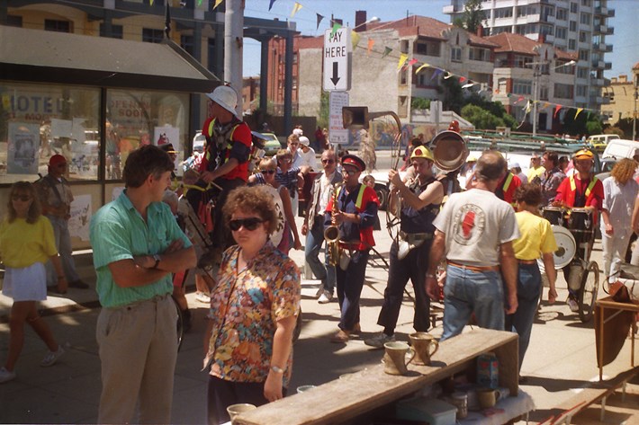 Live horn band playing and walking past the St Kilda Esplanade Market in the 1970s